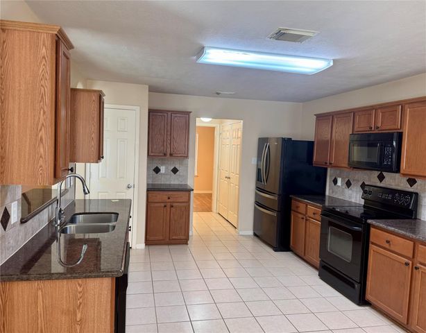 2311 Slate Ridge Lane, Katy, TX 77494