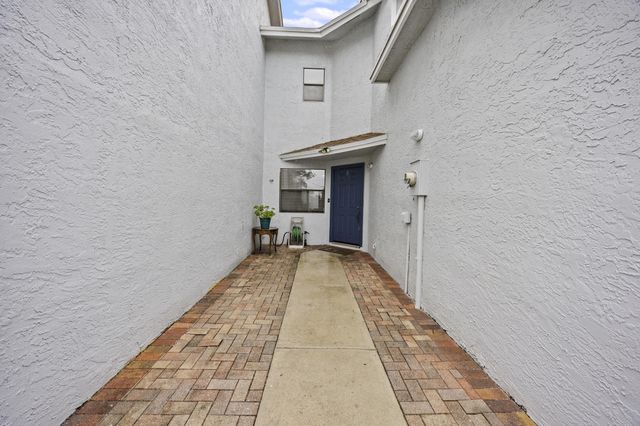 1519 Woodbridge Lakes Circle, West Palm Beach, FL 33406