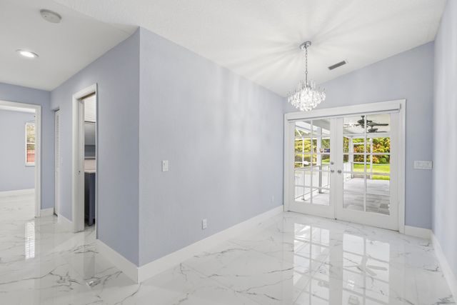 104 Oxford Court, Royal Palm Beach, FL 33411