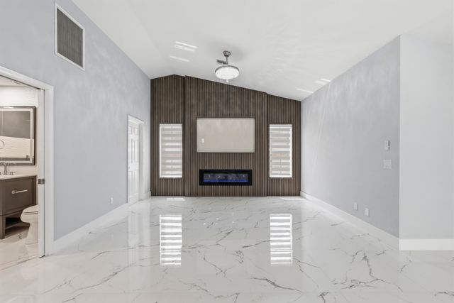104 Oxford Court, Royal Palm Beach, FL 33411