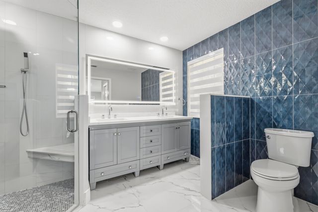 104 Oxford Court, Royal Palm Beach, FL 33411