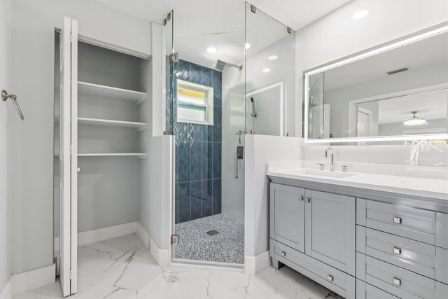 104 Oxford Court, Royal Palm Beach, FL 33411