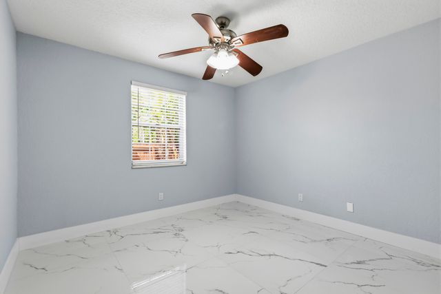104 Oxford Court, Royal Palm Beach, FL 33411