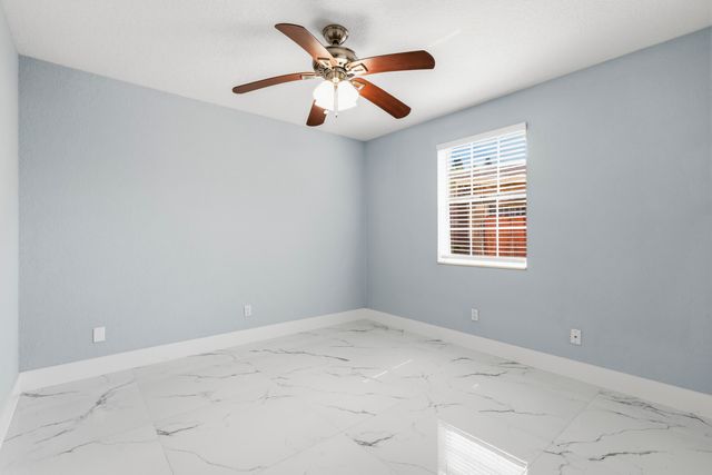 104 Oxford Court, Royal Palm Beach, FL 33411