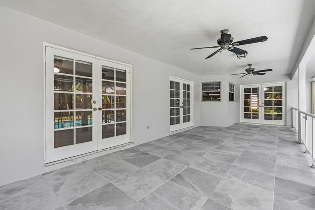 104 Oxford Court, Royal Palm Beach, FL 33411