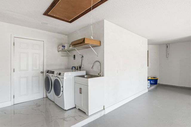104 Oxford Court, Royal Palm Beach, FL 33411