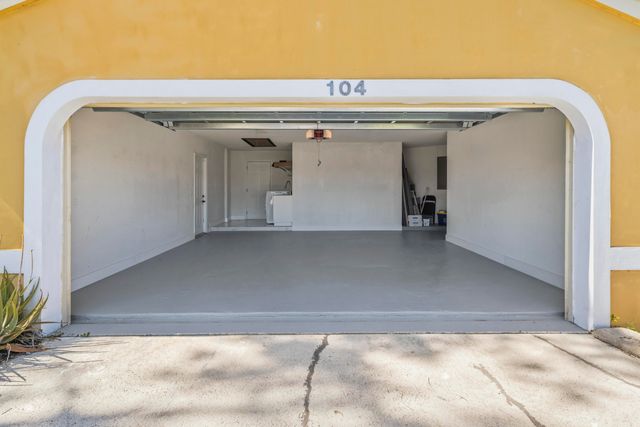 104 Oxford Court, Royal Palm Beach, FL 33411
