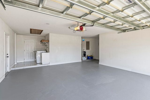 104 Oxford Court, Royal Palm Beach, FL 33411