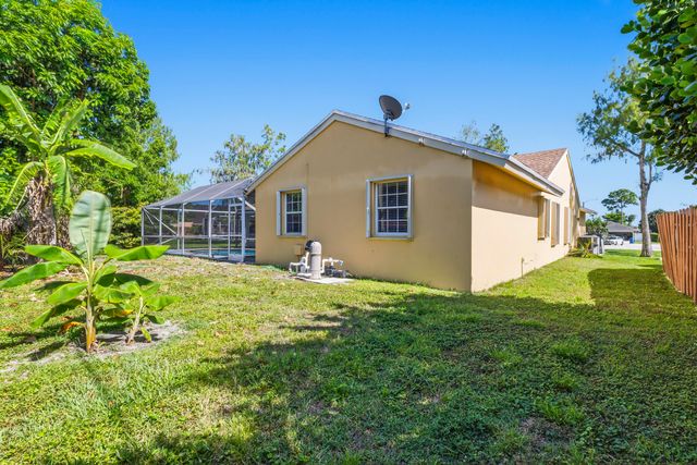 104 Oxford Court, Royal Palm Beach, FL 33411