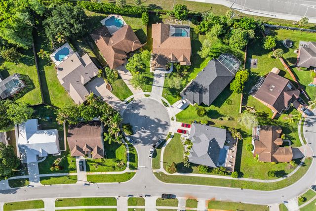 104 Oxford Court, Royal Palm Beach, FL 33411