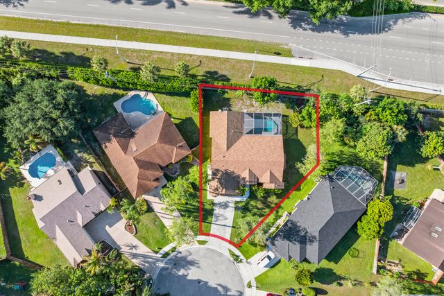 104 Oxford Court, Royal Palm Beach, FL 33411