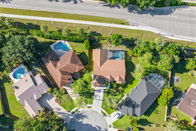 104 Oxford Court, Royal Palm Beach, FL 33411