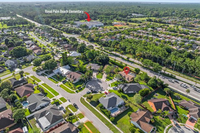 104 Oxford Court, Royal Palm Beach, FL 33411