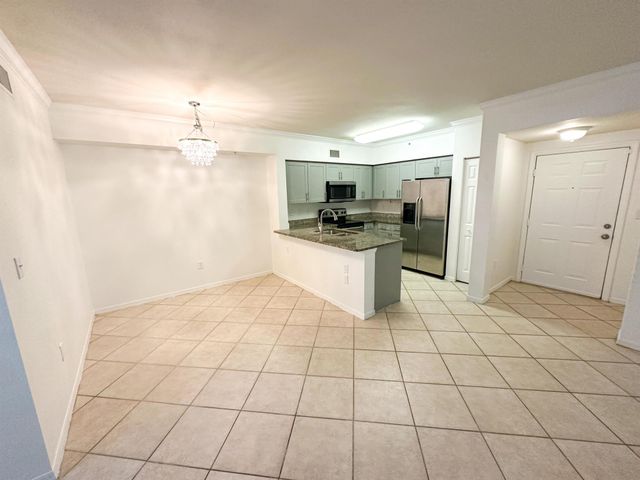 6434 Emerald Dunes Drive 203, West Palm Beach, FL 33411