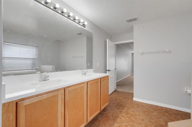 4928 E LAKE COVE BOULEVARD, St Cloud, FL 34771