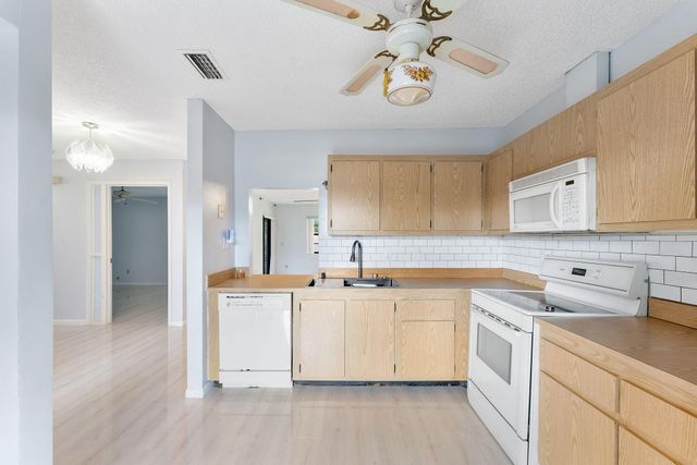 107 Conaskonk Circle, Royal Palm Beach, FL 33411