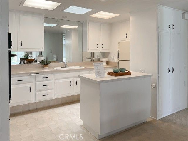 1311 Twin Hills Dr., M12-55D, Seal Beach, CA 90740