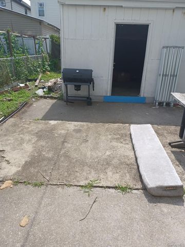 90-02 202nd Street, Hollis, NY 11423