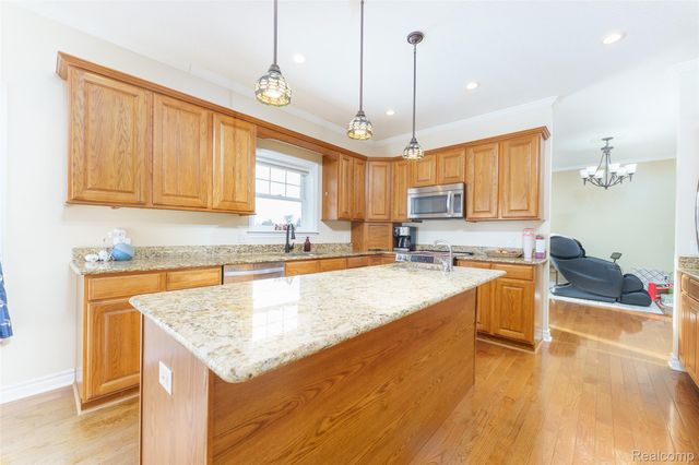 4695 Emerald Valley Loop, Handy Township, MI 48836