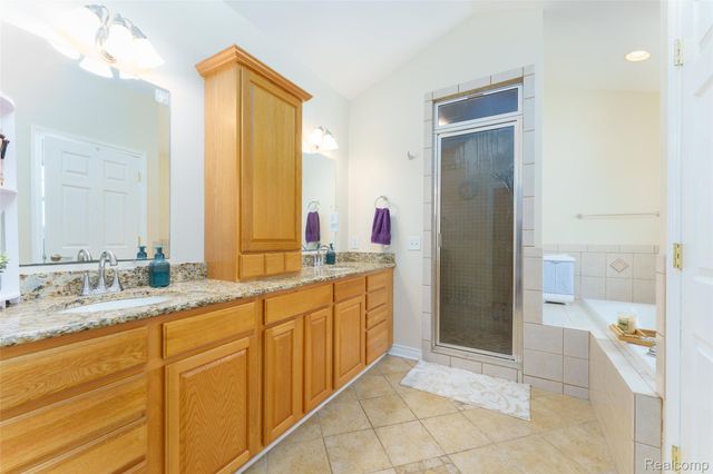 4695 Emerald Valley Loop, Handy Township, MI 48836