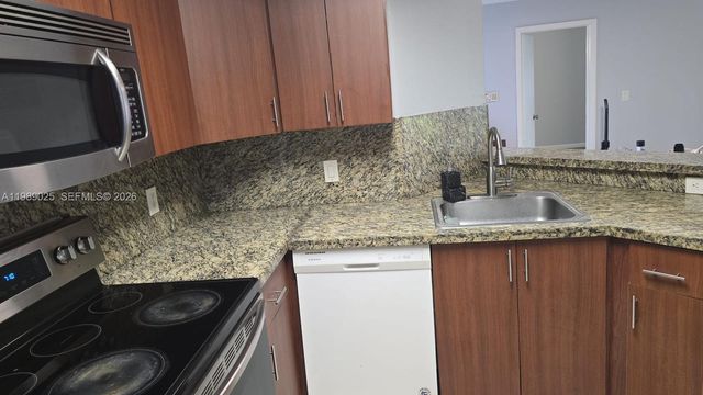 8821 Wiles Road 108, Coral Springs, FL 33067