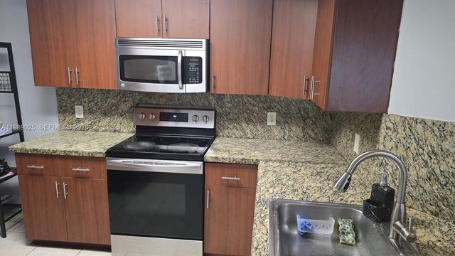 8821 Wiles Road 108, Coral Springs, FL 33067