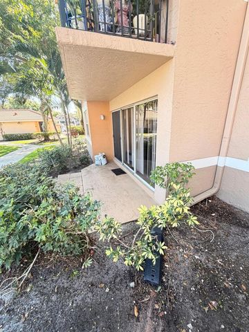 8821 Wiles Road 108, Coral Springs, FL 33067