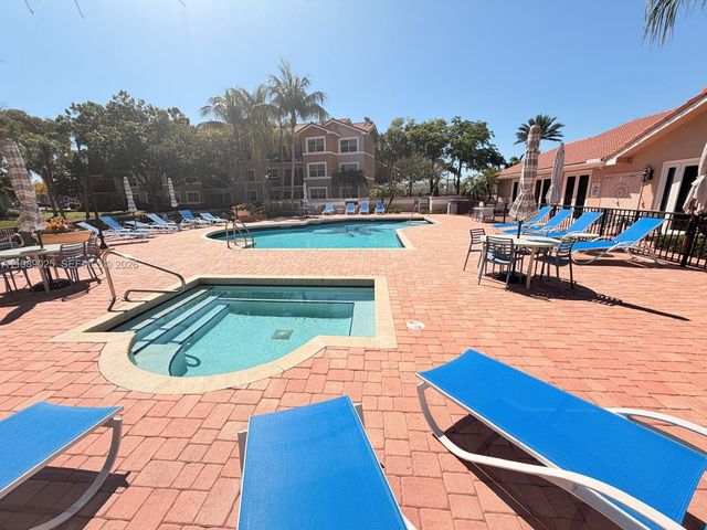 8821 Wiles Road 108, Coral Springs, FL 33067