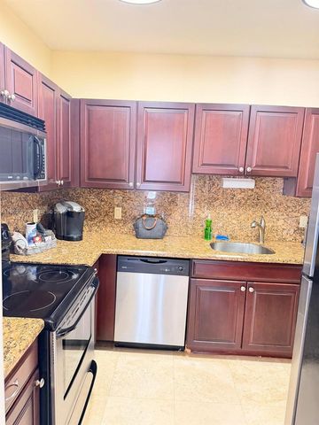 8821 Wiles Road 108, Coral Springs, FL 33067