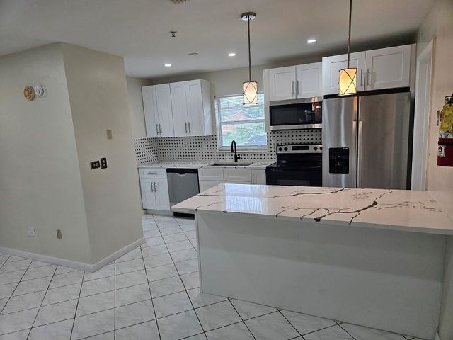 6380 NW 25th Court, Sunrise, FL 33313