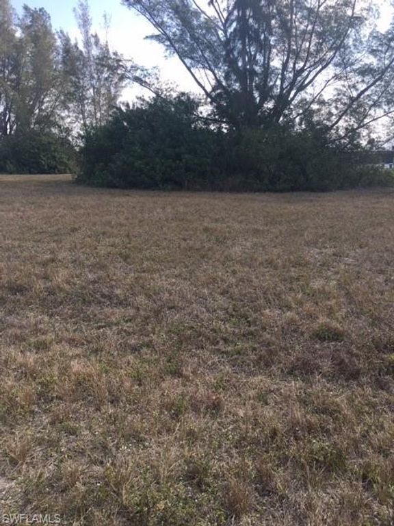 1111 NW 40th PL, CAPE CORAL, FL 33993 — exterior
