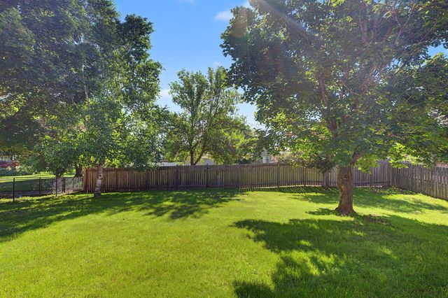 11120 Hampshire Court E, Champlin, MN 55316