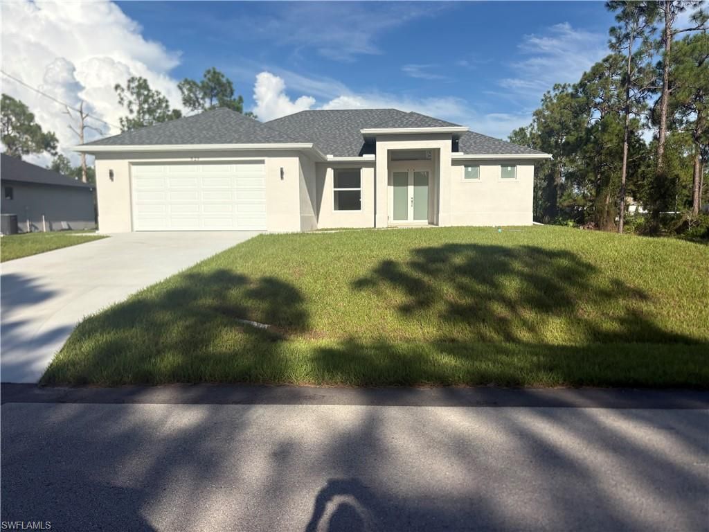 829 Downer AVE S, LEHIGH ACRES, FL 33974 — exterior
