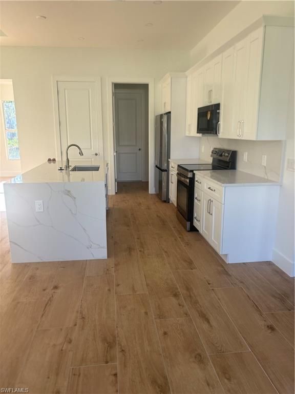 829 Downer AVE S, LEHIGH ACRES, FL 33974 — photo 5