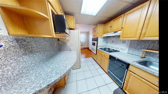 77-11 30th Avenue, East Elmhurst, NY 11370
