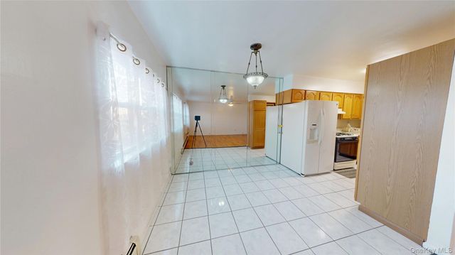 77-11 30th Avenue, East Elmhurst, NY 11370