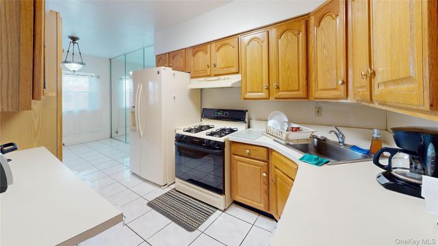 77-11 30th Avenue, East Elmhurst, NY 11370