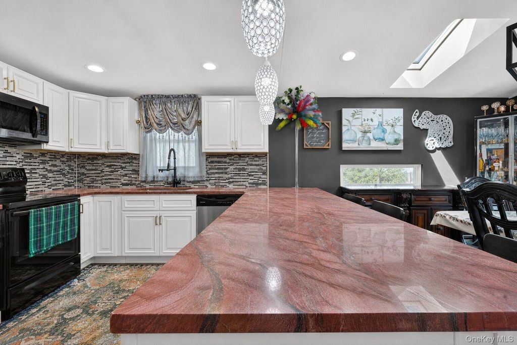142 N 27th Street, Wheatley Heights, NY 11798 — photo 4