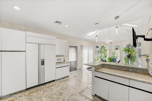 5 Cherry Point Court, Morganville, NJ 07751