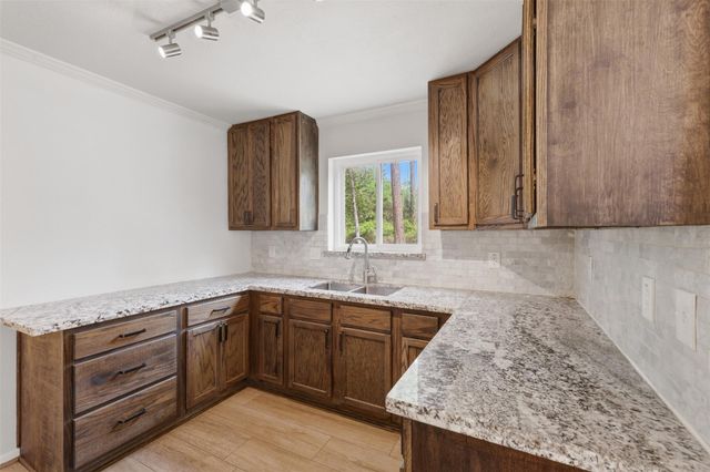 24714 Hunters Hollow Drive, Spring, TX 77380