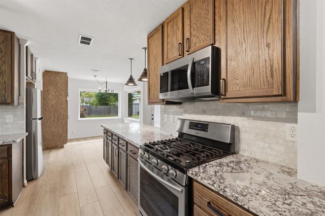 24714 Hunters Hollow Drive, Spring, TX 77380