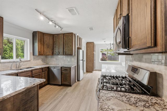 24714 Hunters Hollow Drive, Spring, TX 77380