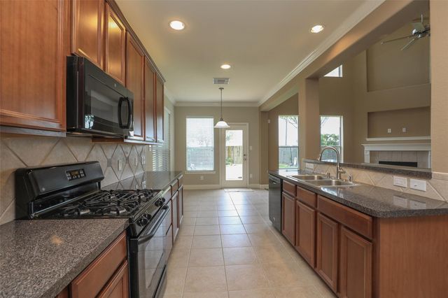 9603 Red Rugossa Drive, Houston, TX 77095