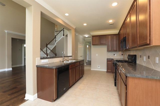 9603 Red Rugossa Drive, Houston, TX 77095
