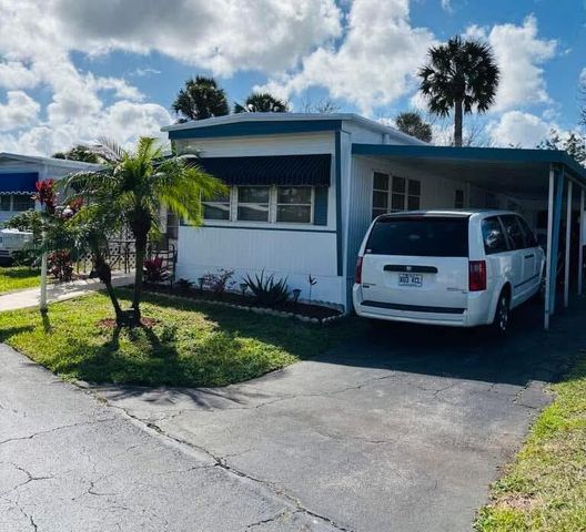 415 Gardenia Court, Deerfield Beach, FL 33442