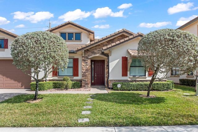 8840 Watercrest Cir Circle E, Parkland, FL 33076