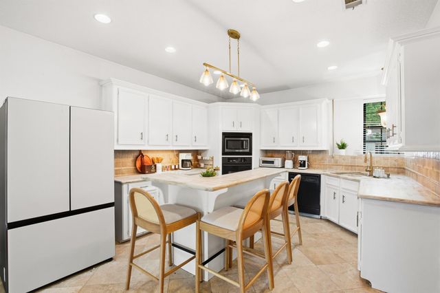 7714 Par Five Drive, Humble, TX 77346