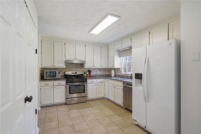 3366 Woodlaurel Drive, Snellville, GA 30078