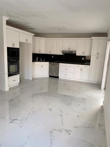 11301 ROCKINGHORSE RD, Cooper City, FL 33027