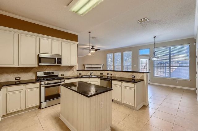 9028 Enchanted Ridge Drive, Plano, TX 75025